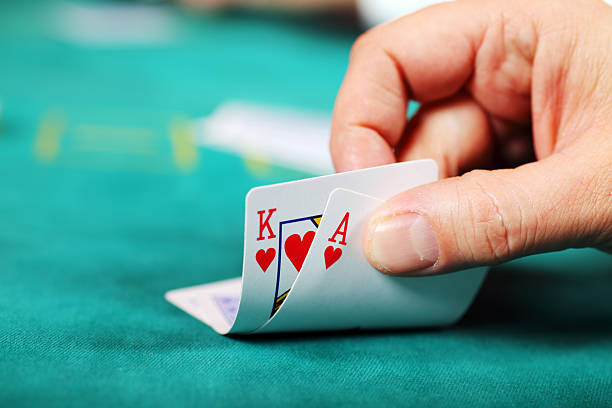 tartoto Caribbean Stud Poker mobile interface showing player cards, dealer's exposed card, and fold/call buttons